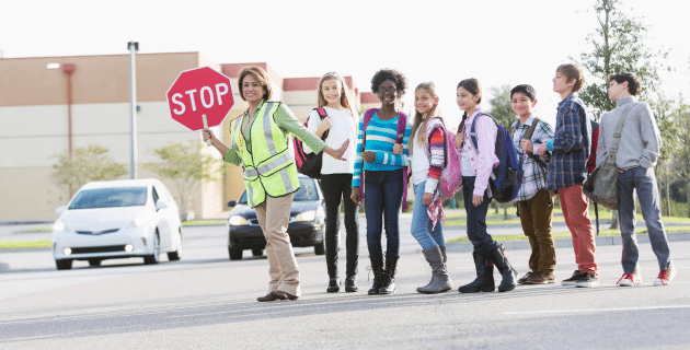 School crossing guard with students