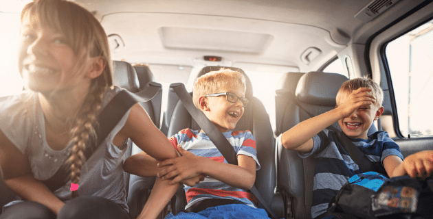Kids in back seat of car
