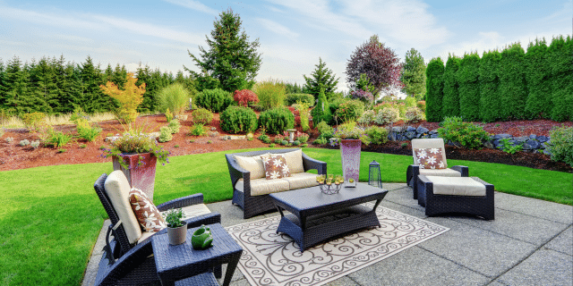 an image showing a well-appointed patio and yard